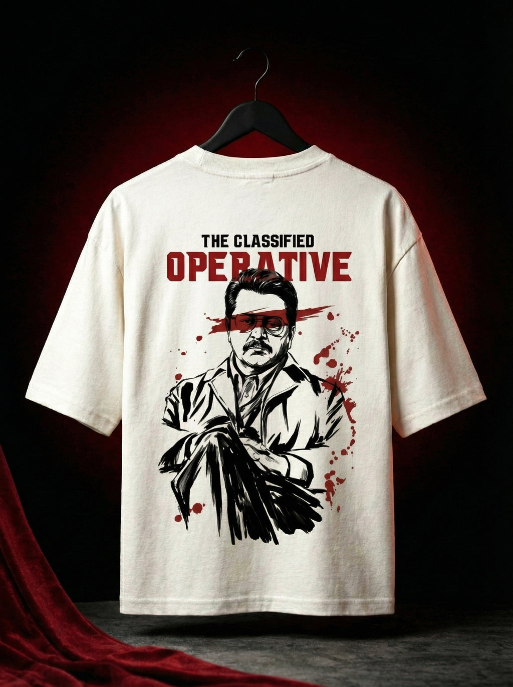 Off-white oversized graphic t-shirt hanging on hanger showing full back print with bold illustrated character and red accents, cinematic spy inspired design, streetwear oversized tee India, premium cotton graphic t shirt men