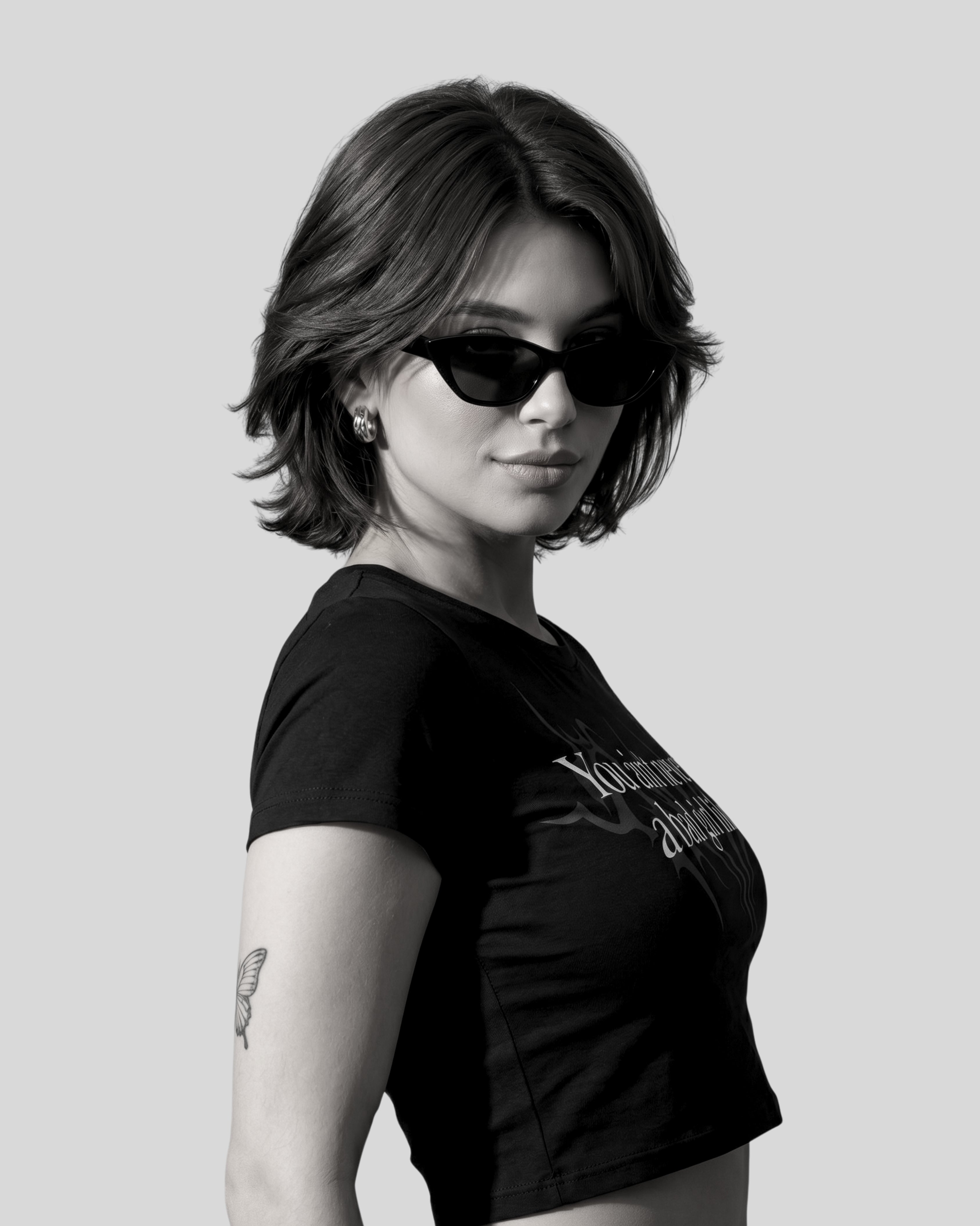Confident woman wearing black aesthetic crop top with bad girl attitude, gen z streetwear fashion inspired by underground rap reble vibe and dhurandhar cinematic style, Edgy gen z fashion look with black bad girl crop top, aesthetic streetwear outfit inspired by underground rap culture and dhurandhar style confidence
