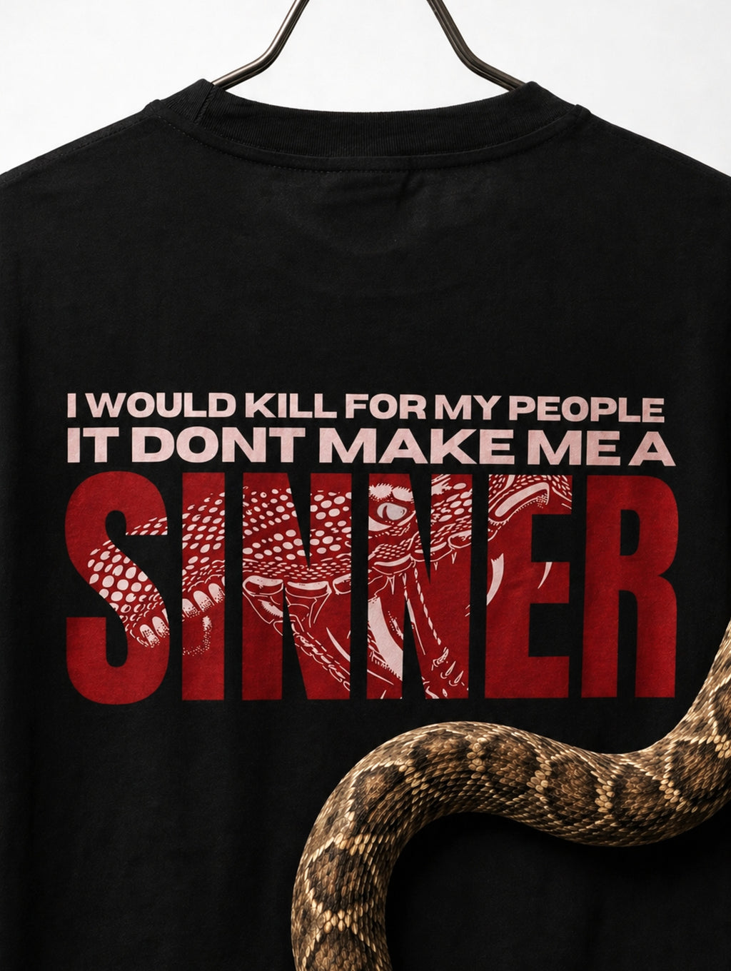 Close up of Noverra SINNER back print oversized t-shirt with I would kill for my people it dont make me a sinner text and red snake graphic, heavy GSM boxy tee