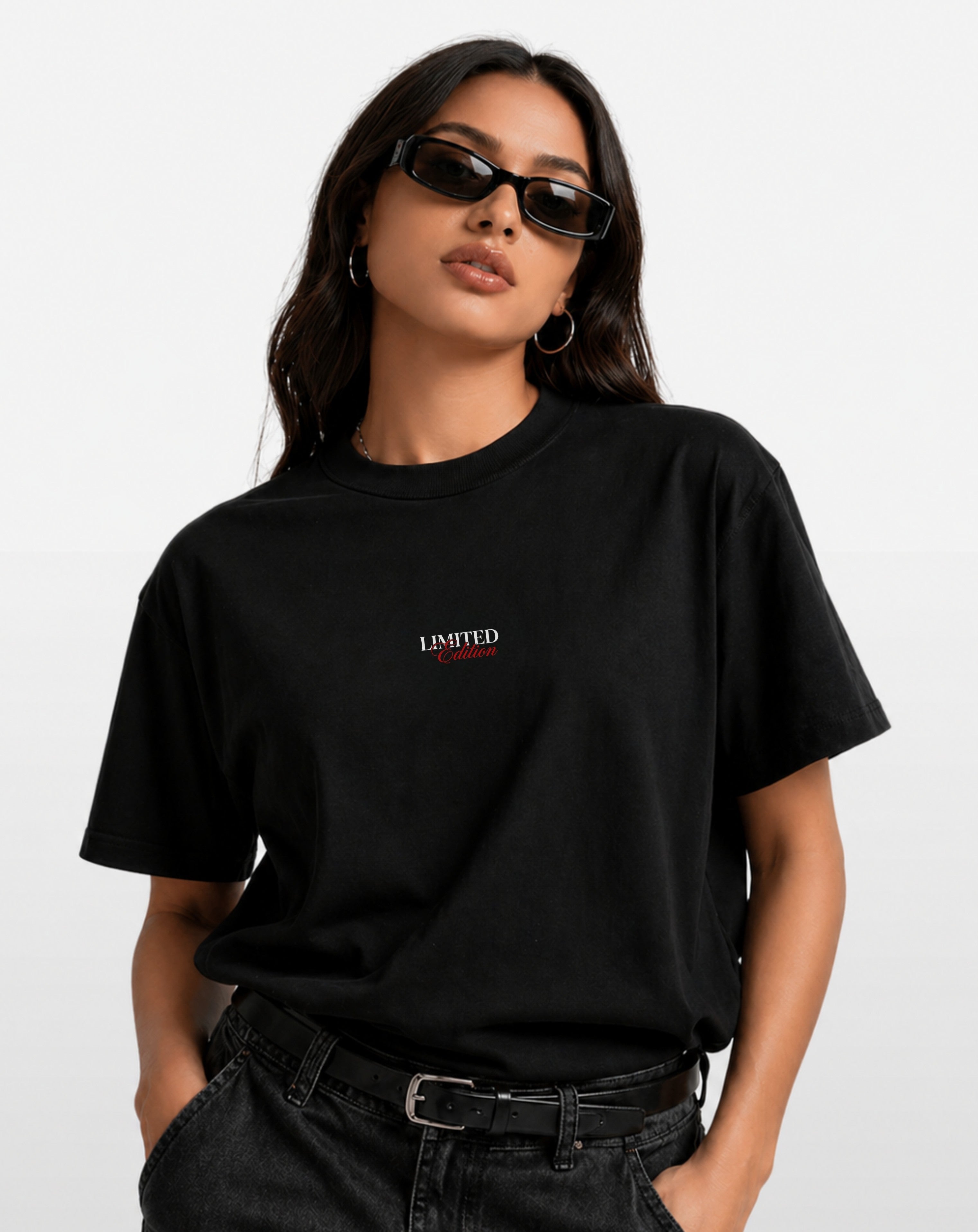 Women wearing Noverra SINNER black oversized boxy fit t-shirt with LIMITED Edition chest print, 240 GSM heavy cotton Gen Z streetwear India"
